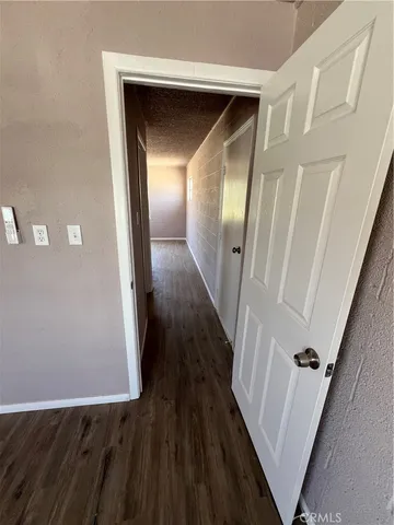 a bathroom with a toilet and a tub