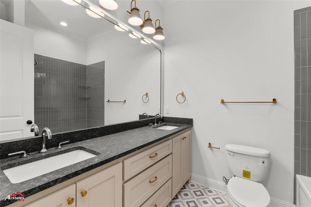 35 Turtle Creek Drive Benton, LA 71006 - Photo 26 of 32 a bathroom with a granite countertop sink a toilet and a mirror