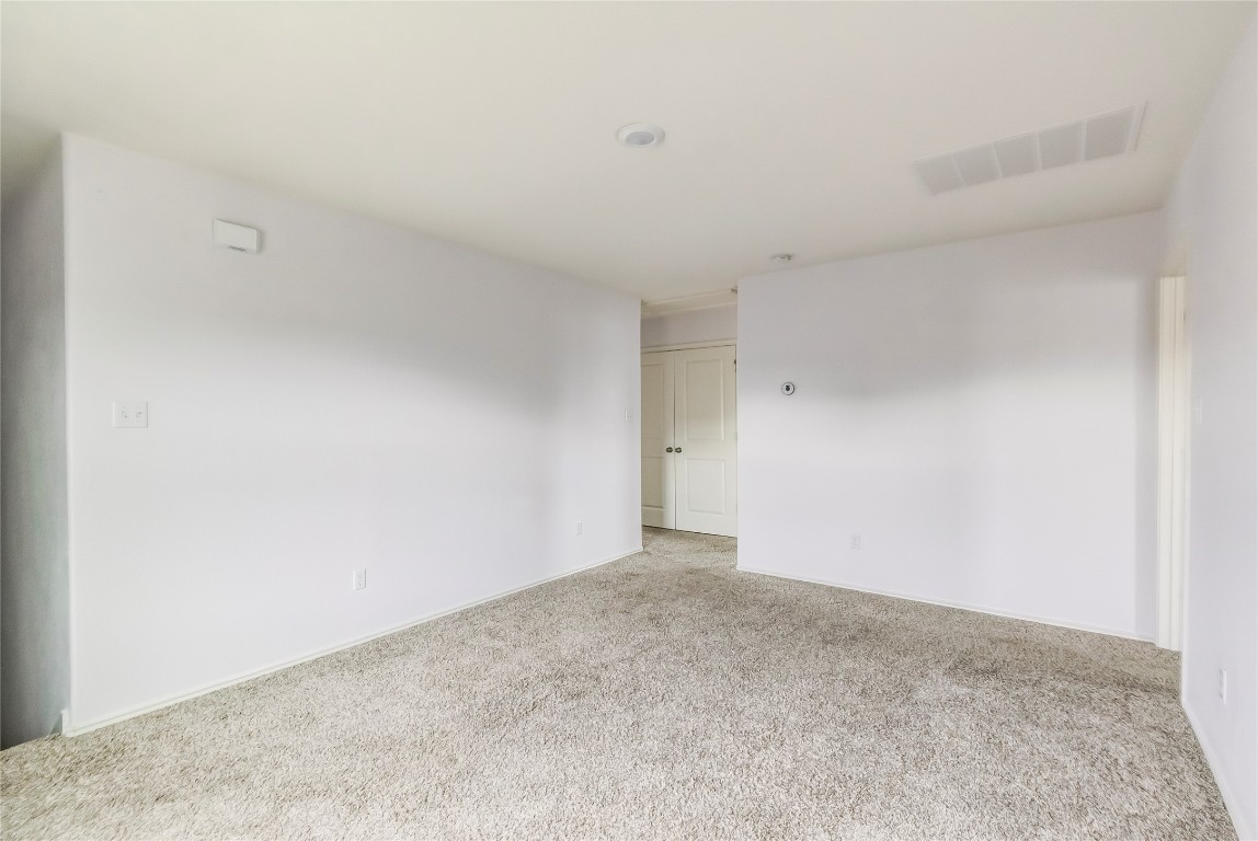 772 Circle Way Jarrell, TX 76537 - Photo 16 of 35 Spare room with carpet and baseboards