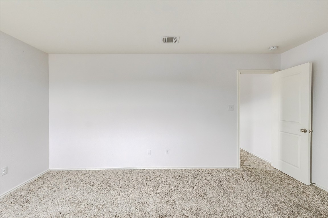 772 Circle Way Jarrell, TX 76537 - Photo 20 of 35 Carpeted spare room with baseboards