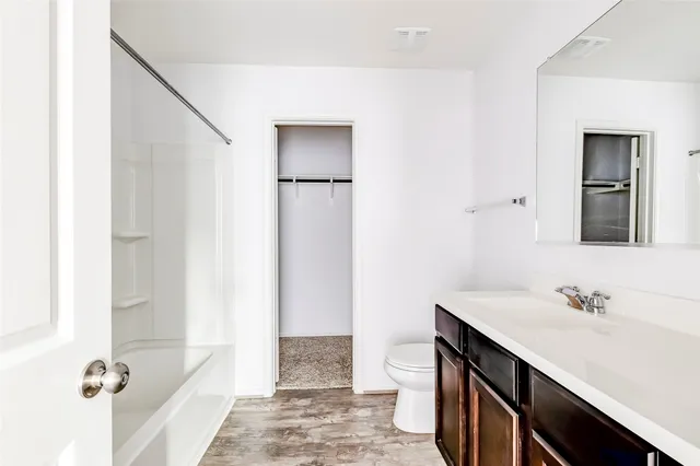 an empty room with a empty space and window