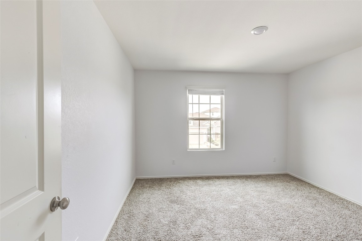 772 Circle Way Jarrell, TX 76537 - Photo 25 of 35 Carpeted spare room with baseboards