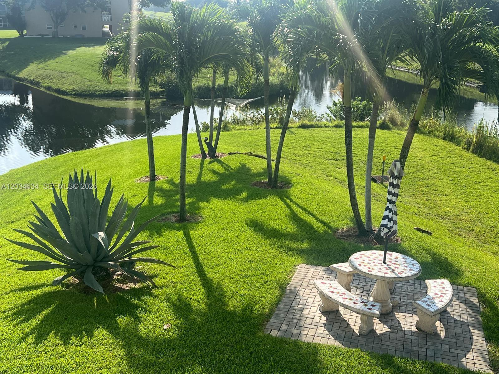 9880 Marina Boulevard, Unit 1516 Boca Raton, FL 33428 - Photo 27 of 32 a view of swimming pool from a balcony