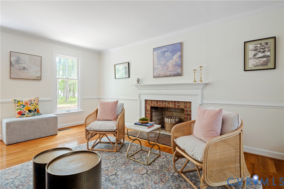2727 River Run Road Prince George, VA 23875 - Photo 5 of 35 Wood-burning fireplace and hardwood floors.