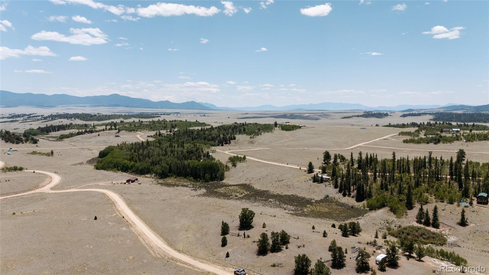 458 Remington Road Como, CO 80432 - Photo 9 of 17 a view of a terrace with a lake view