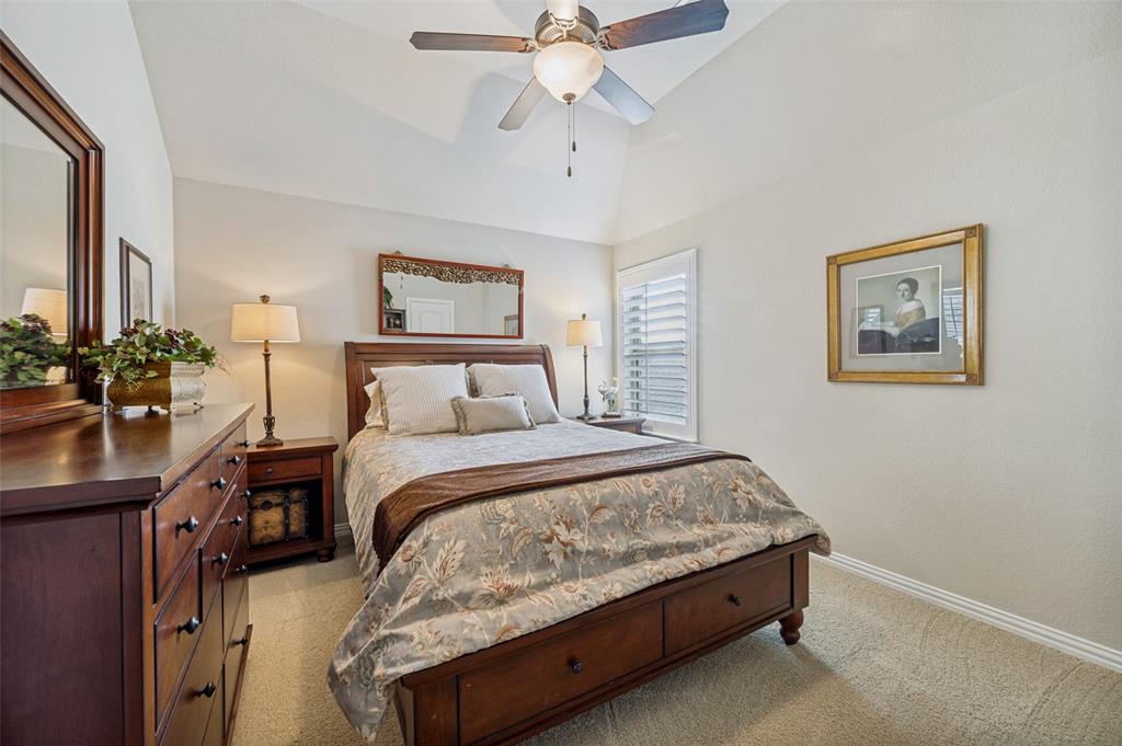 3036 Avondale The Colony, TX 75056 - Photo 26 of 40 A comfortable secondary bedroom with great natural light and a warm, inviting feel—perfect for guests or family.