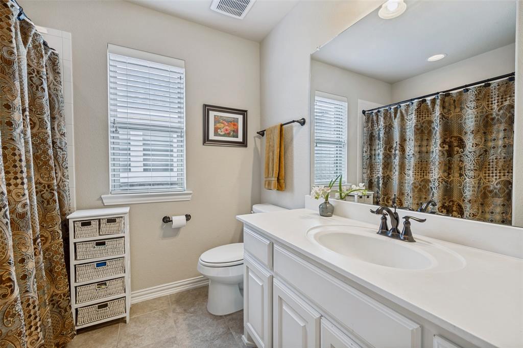 3036 Avondale The Colony, TX 75056 - Photo 27 of 40 This secondary bathroom offers a bright, functional layout with great natural light and plenty of space for everyday use.