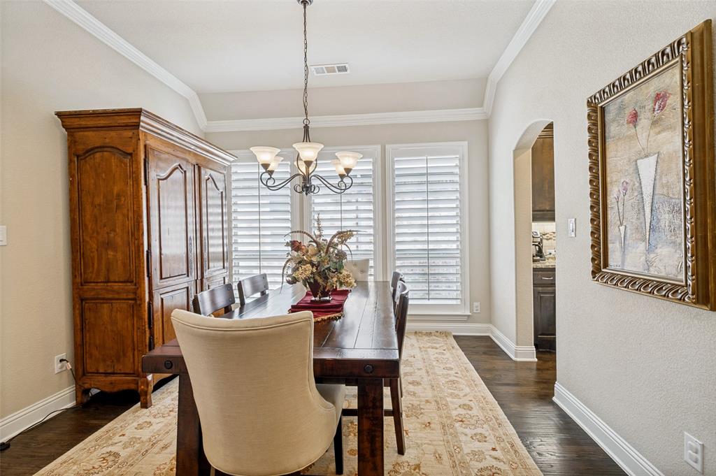 3036 Avondale The Colony, TX 75056 - Photo 8 of 40 With large windows bringing in plenty of natural light, this dining area feels open, airy, and perfect for both everyday living and entertaining.