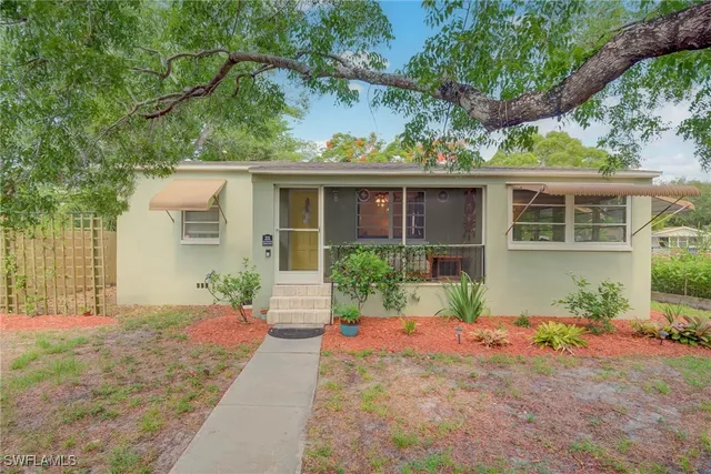 front view of a house with a yard
