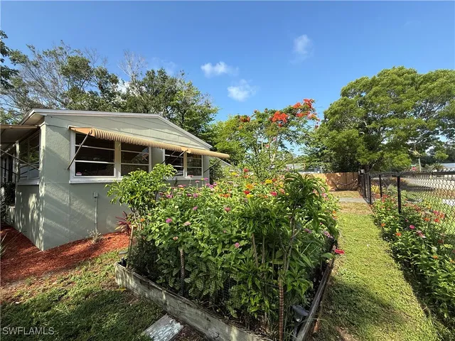 a house with trees in front of it