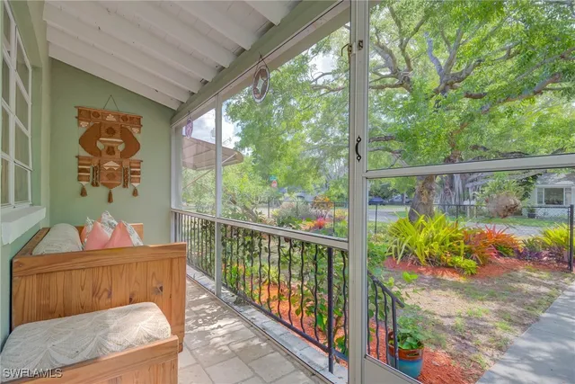 a balcony view with a potted plant