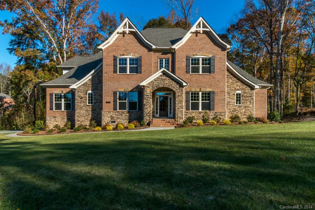 1600 Buckland Court Indian Land, SC 29707 - Photo 1 of 24 a front view of a house with a garden