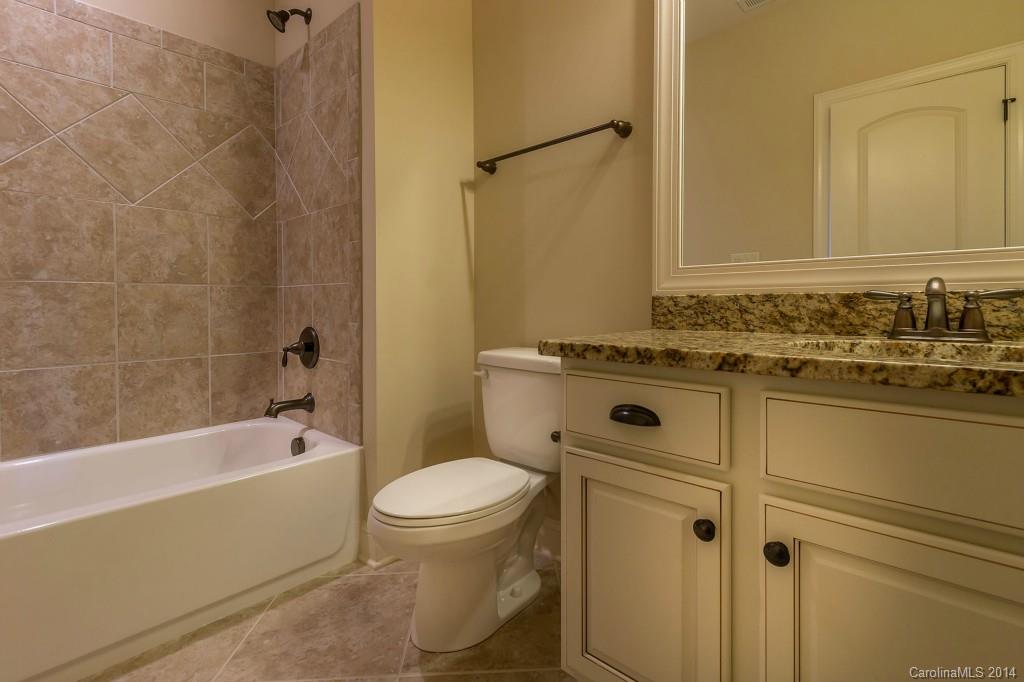1600 Buckland Court Indian Land, SC 29707 - Photo 19 of 24 a bathroom with a sink a toilet and a bathtub