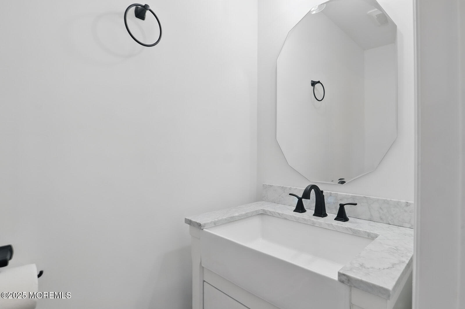 18 Neptune Place North Middletown, NJ 07748 - Photo 12 of 49 a bathroom with a sink and mirror