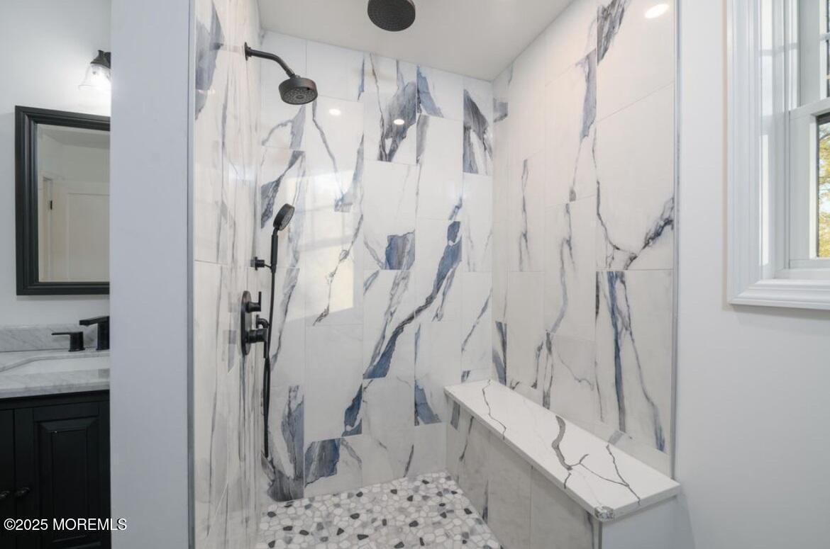 18 Neptune Place North Middletown, NJ 07748 - Photo 18 of 49 a bathroom with a shower and a sink