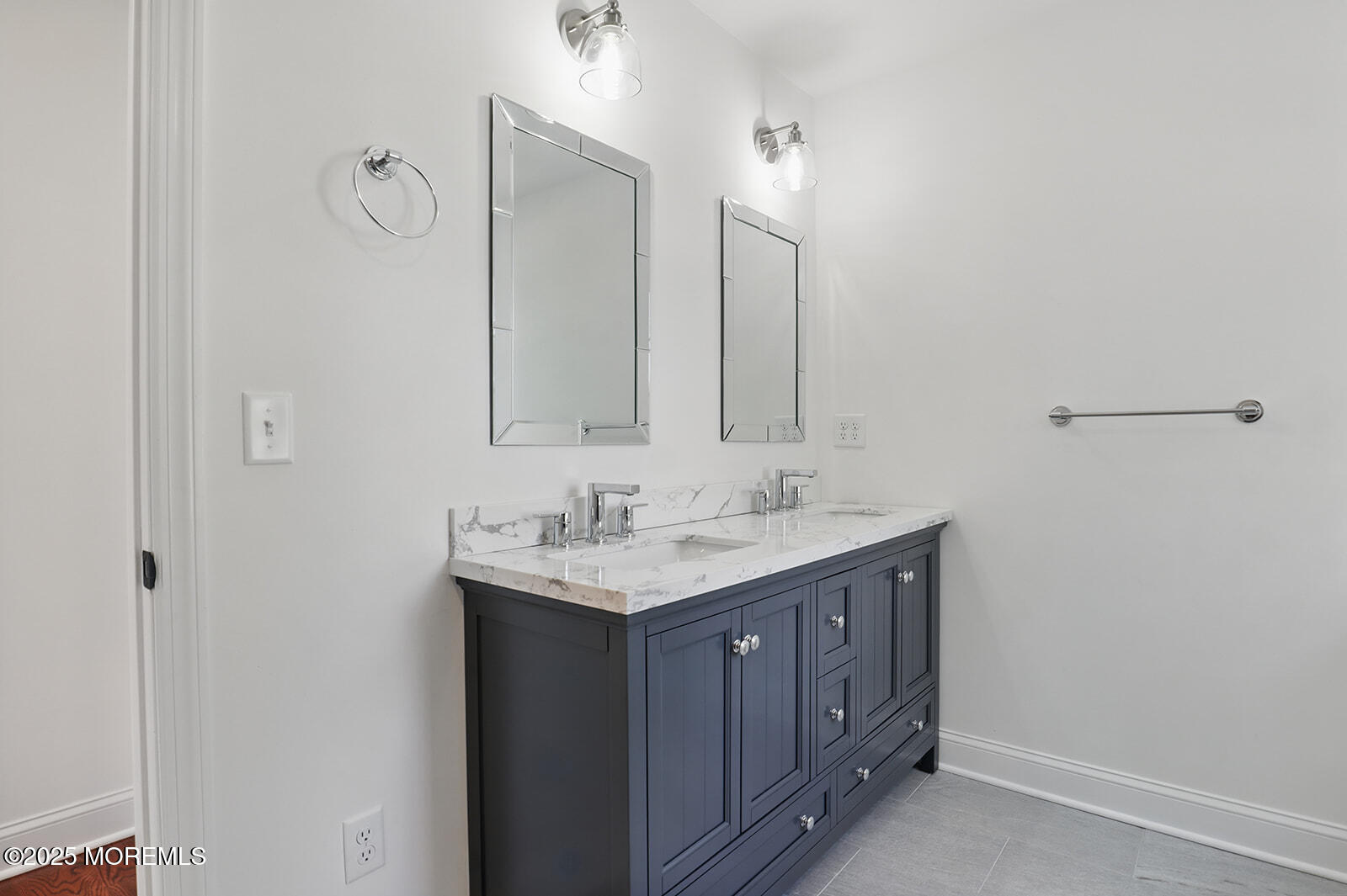 18 Neptune Place North Middletown, NJ 07748 - Photo 26 of 49 a bathroom with a granite countertop sink two mirror and a