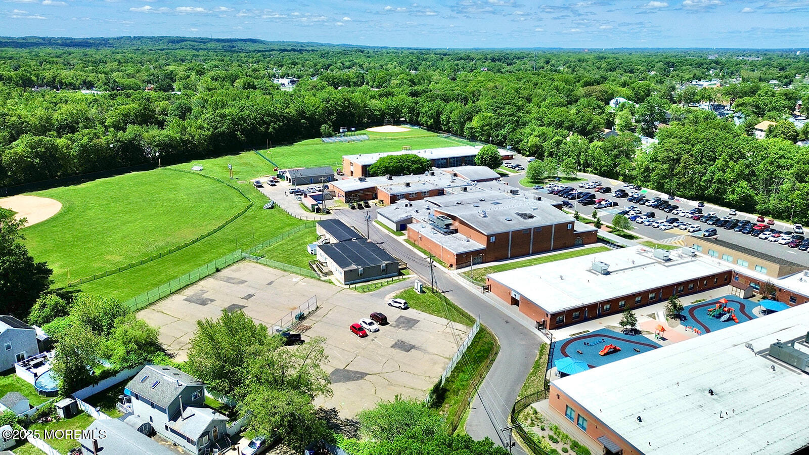 18 Neptune Place North Middletown, NJ 07748 - Photo 40 of 49 an aerial view of a house having yard