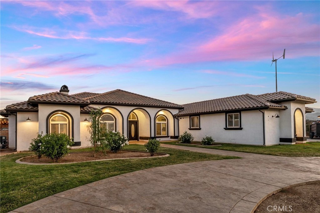 7381 Cygnet Road Phelan, CA 92371 - Photo 2 of 64 a front view of a house with a yard