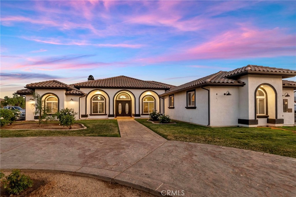 7381 Cygnet Road Phelan, CA 92371 - Photo 3 of 64 a house view with a garden space