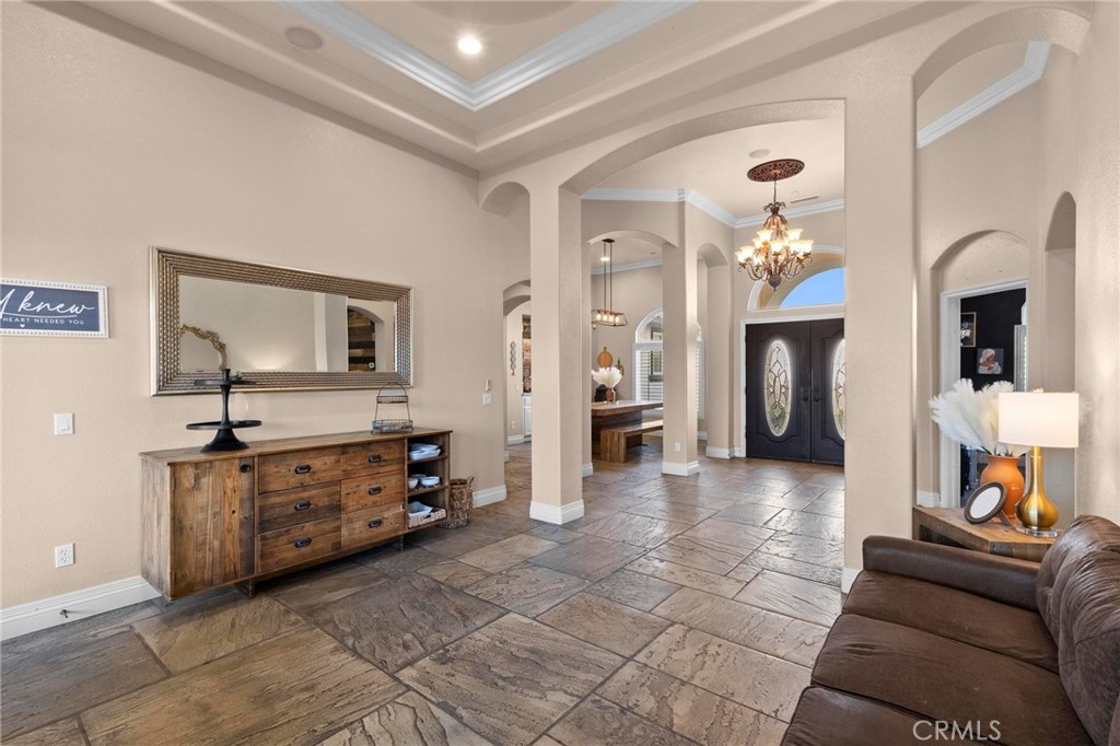 7381 Cygnet Road Phelan, CA 92371 - Photo 34 of 64 a living room with furniture and a flat screen tv