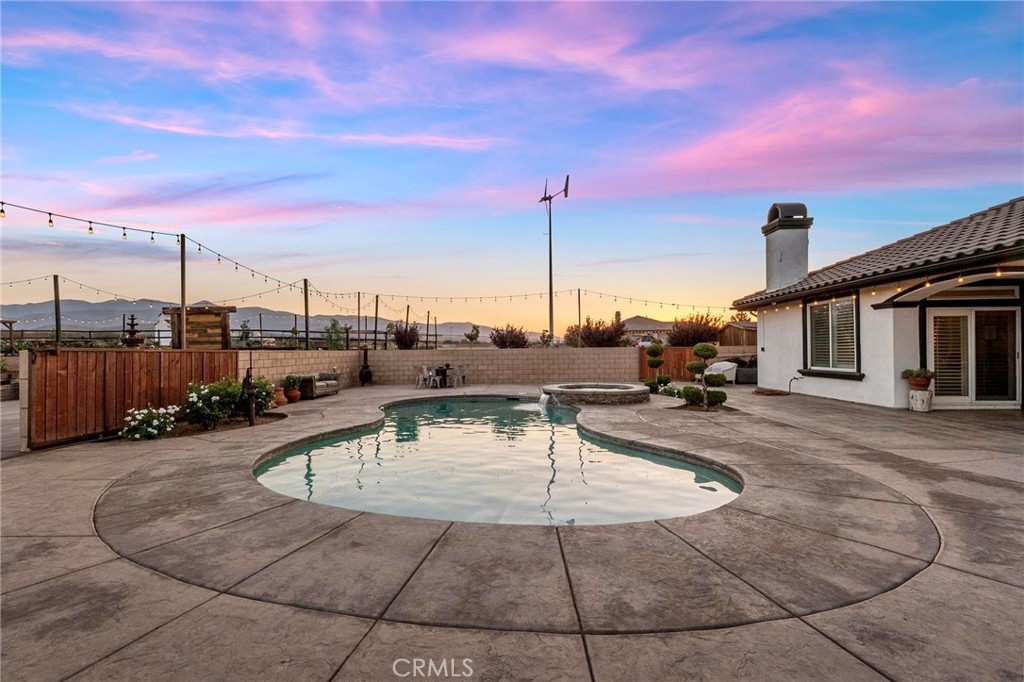 7381 Cygnet Road Phelan, CA 92371 - Photo 39 of 64 a view of a patio with a table and chairs