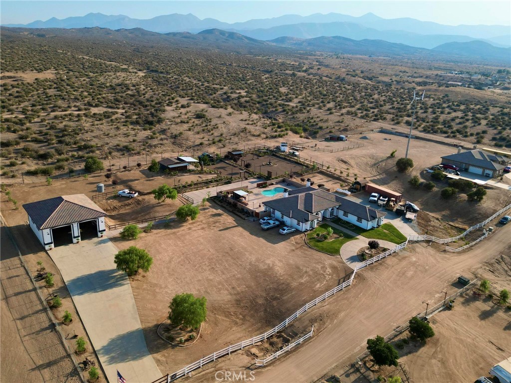7381 Cygnet Road Phelan, CA 92371 - Photo 62 of 64 an aerial view of residential houses with outdoor space
