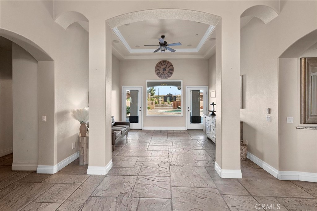 7381 Cygnet Road Phelan, CA 92371 - Photo 7 of 64 a view of an entryway with a chandelier