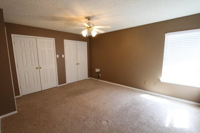 2723 110th Street Lubbock, TX 79423 - Photo 7 of 10 a view of an empty room with a window