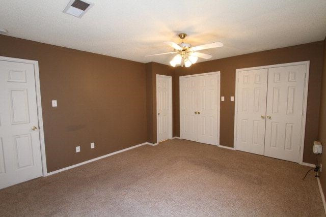 2723 110th Street Lubbock, TX 79423 - Photo 8 of 10 a view of an empty room with a window