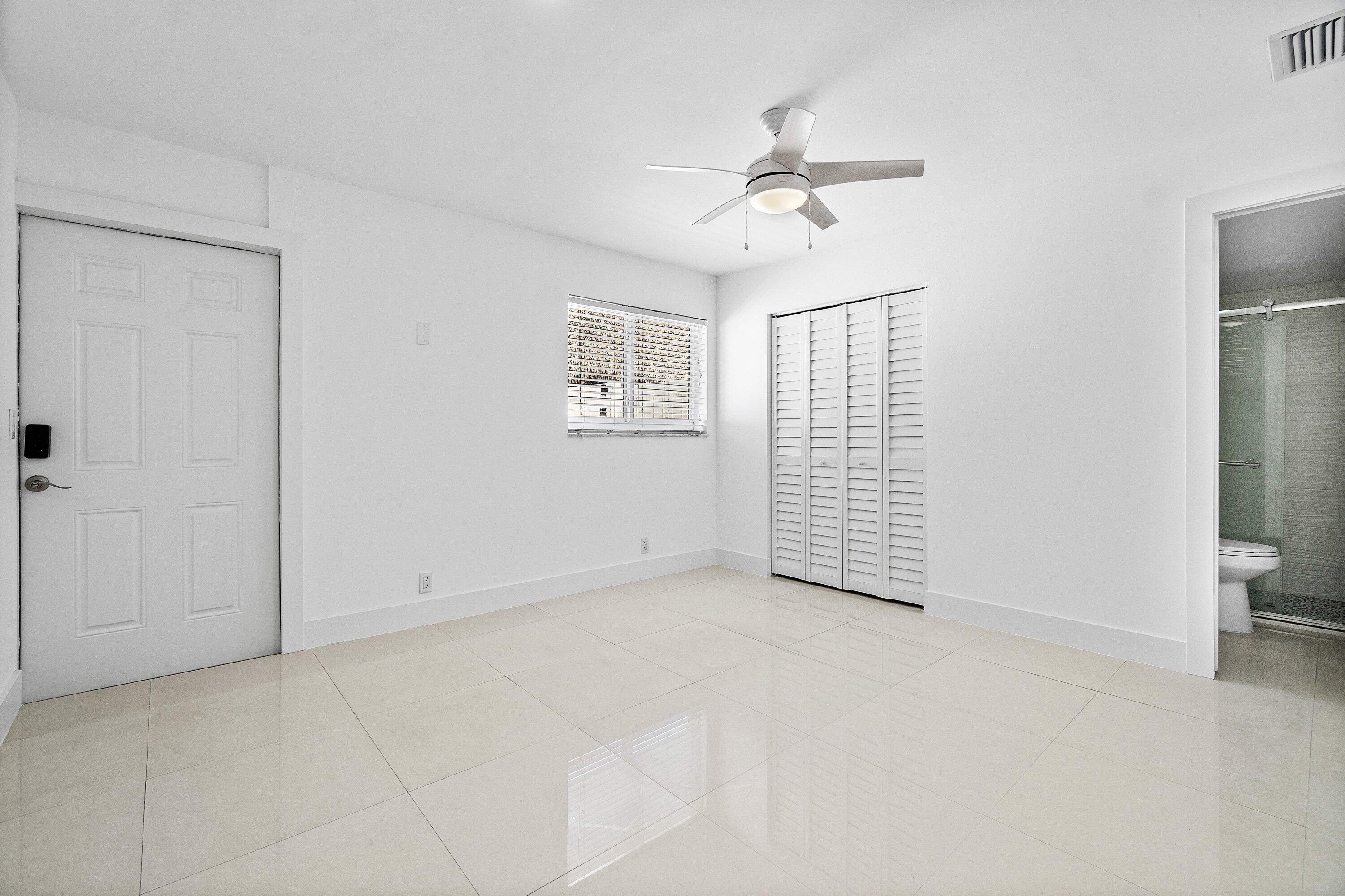 1531 Northwest 4th Street Boca Raton, FL 33486 - Photo 18 of 34 a view of an empty room with a window