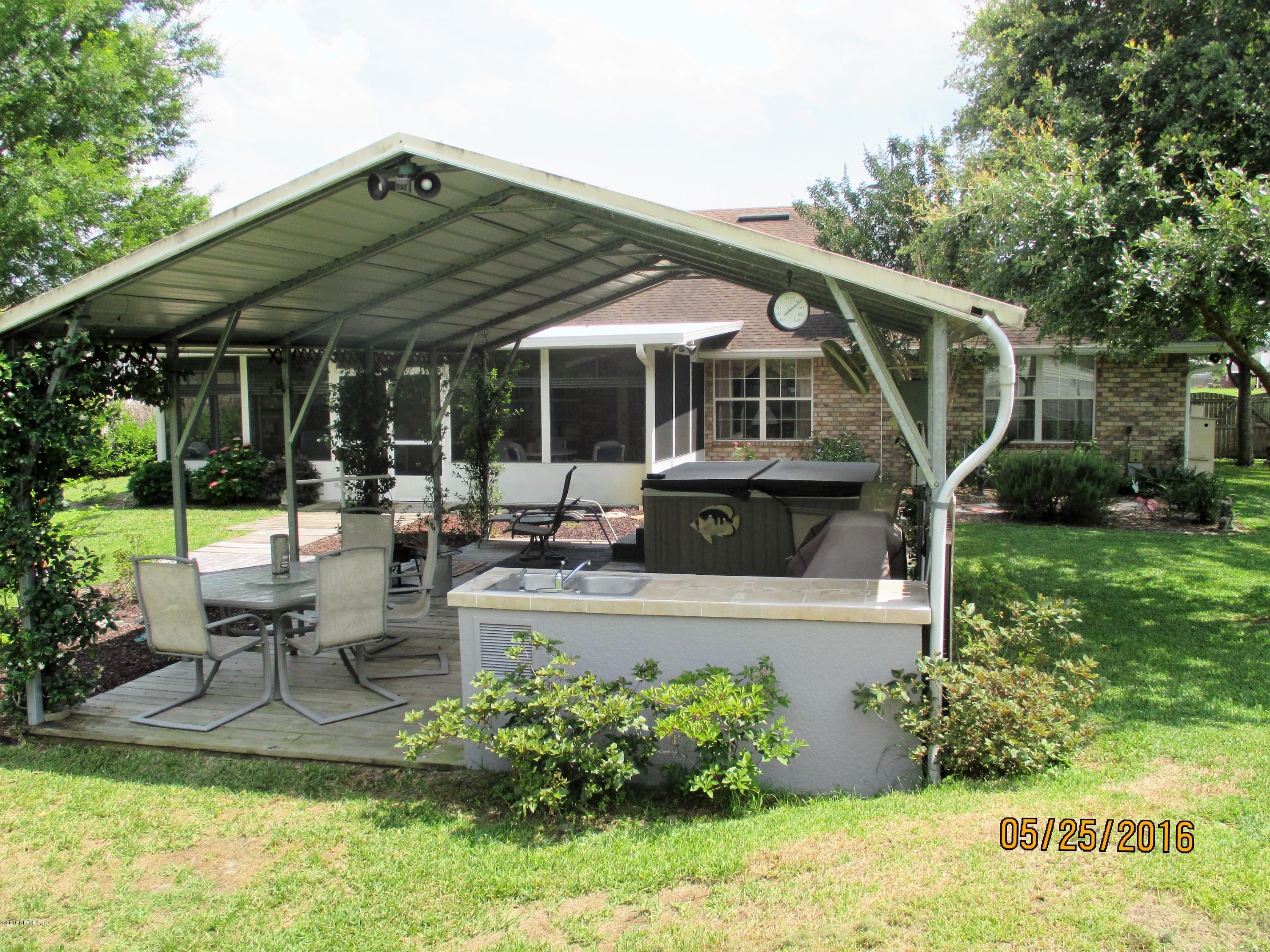 3036 Longleaf Ranch Circle Middleburg, FL 32068 - Photo 28 of 33 Cover BBQ area with wet bar