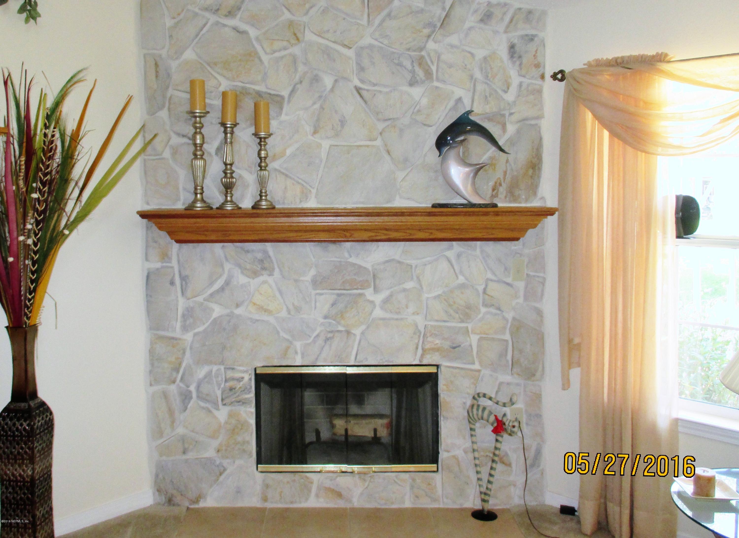 3036 Longleaf Ranch Circle Middleburg, FL 32068 - Photo 9 of 33 Fireplace