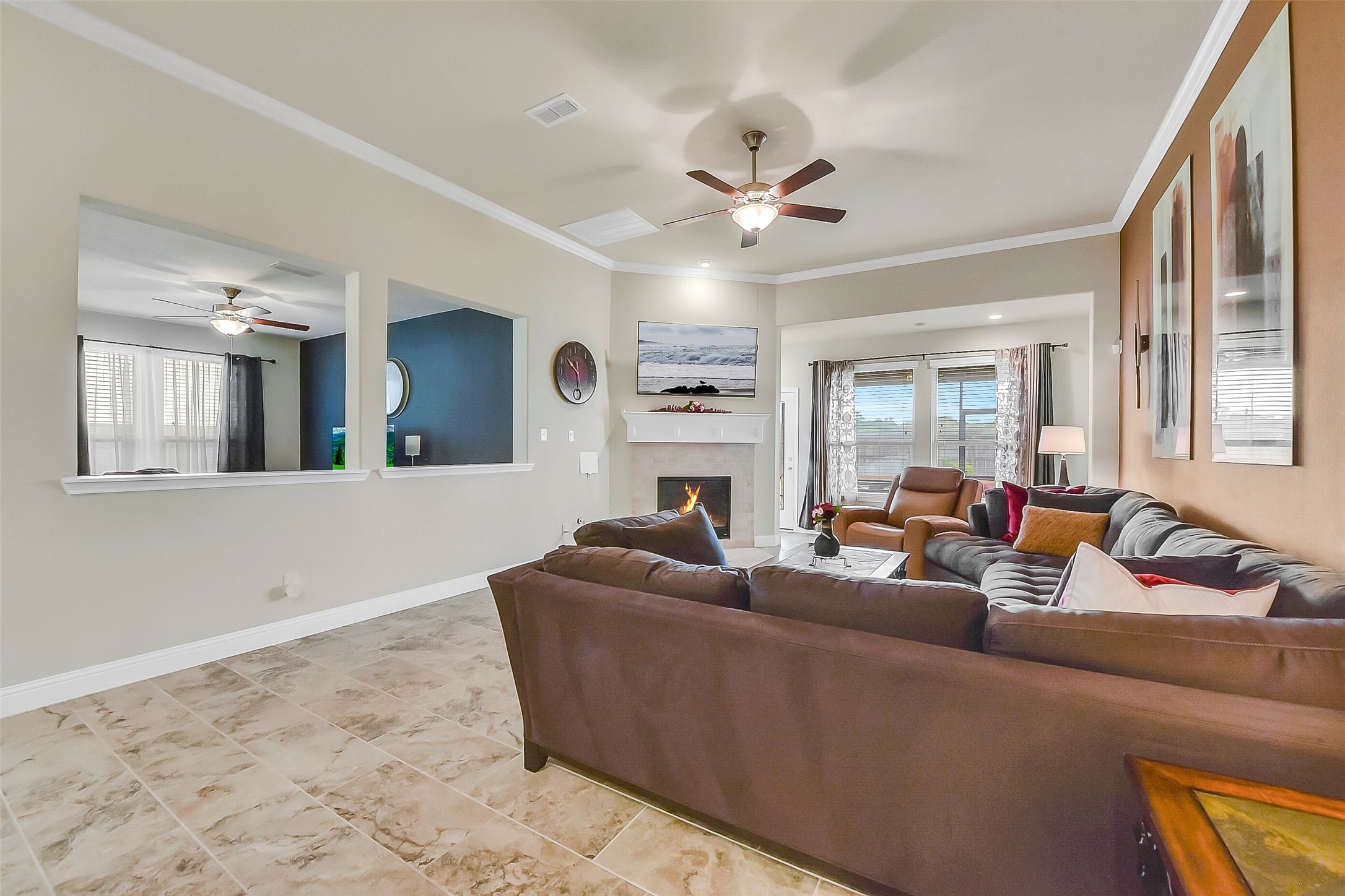 9519 Carson Lane Rosharon, TX 77583 - Photo 18 of 39 a living room with furniture and a fireplace