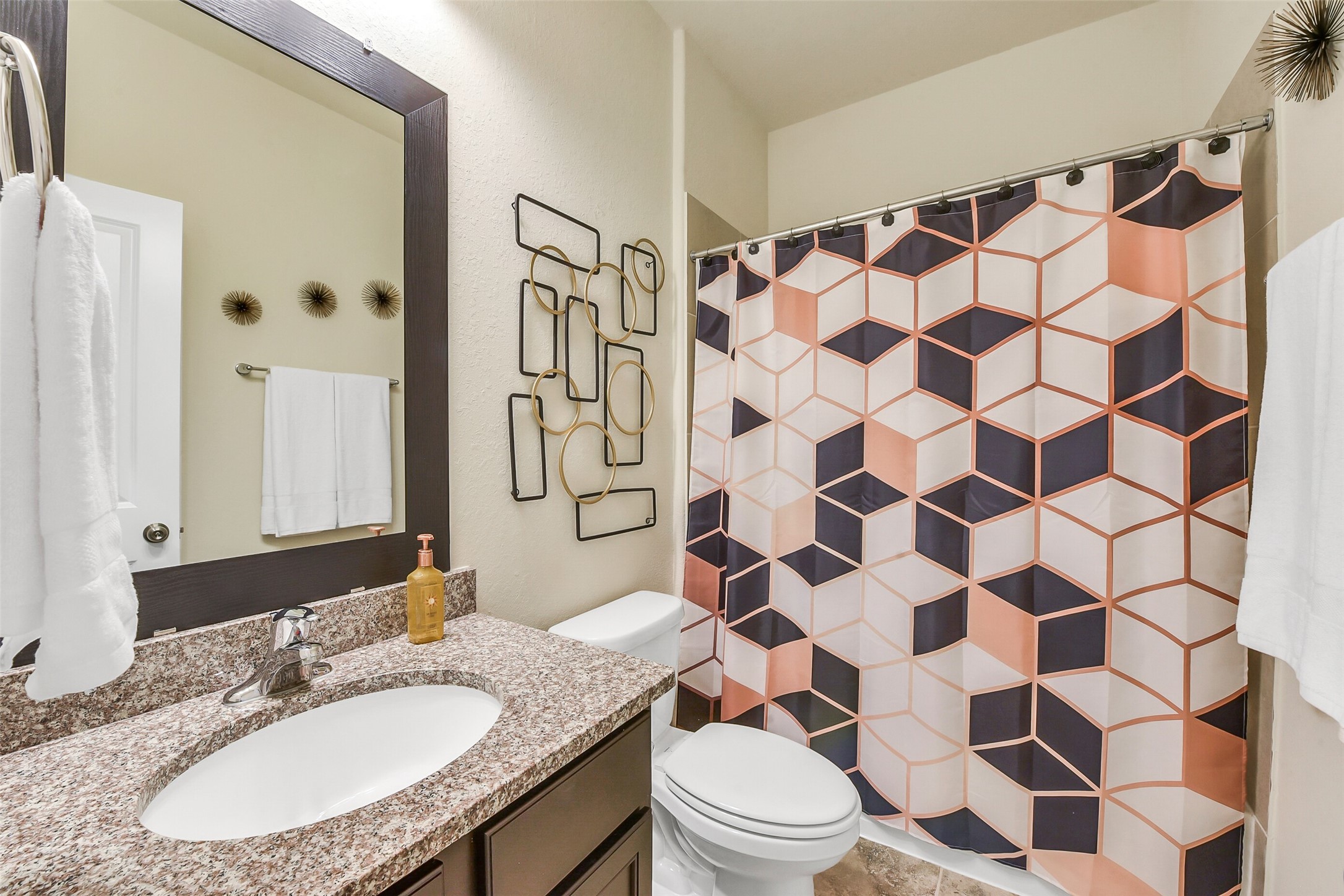 9519 Carson Lane Rosharon, TX 77583 - Photo 28 of 39 a bathroom with a granite countertop bathtub sink mirror and shower