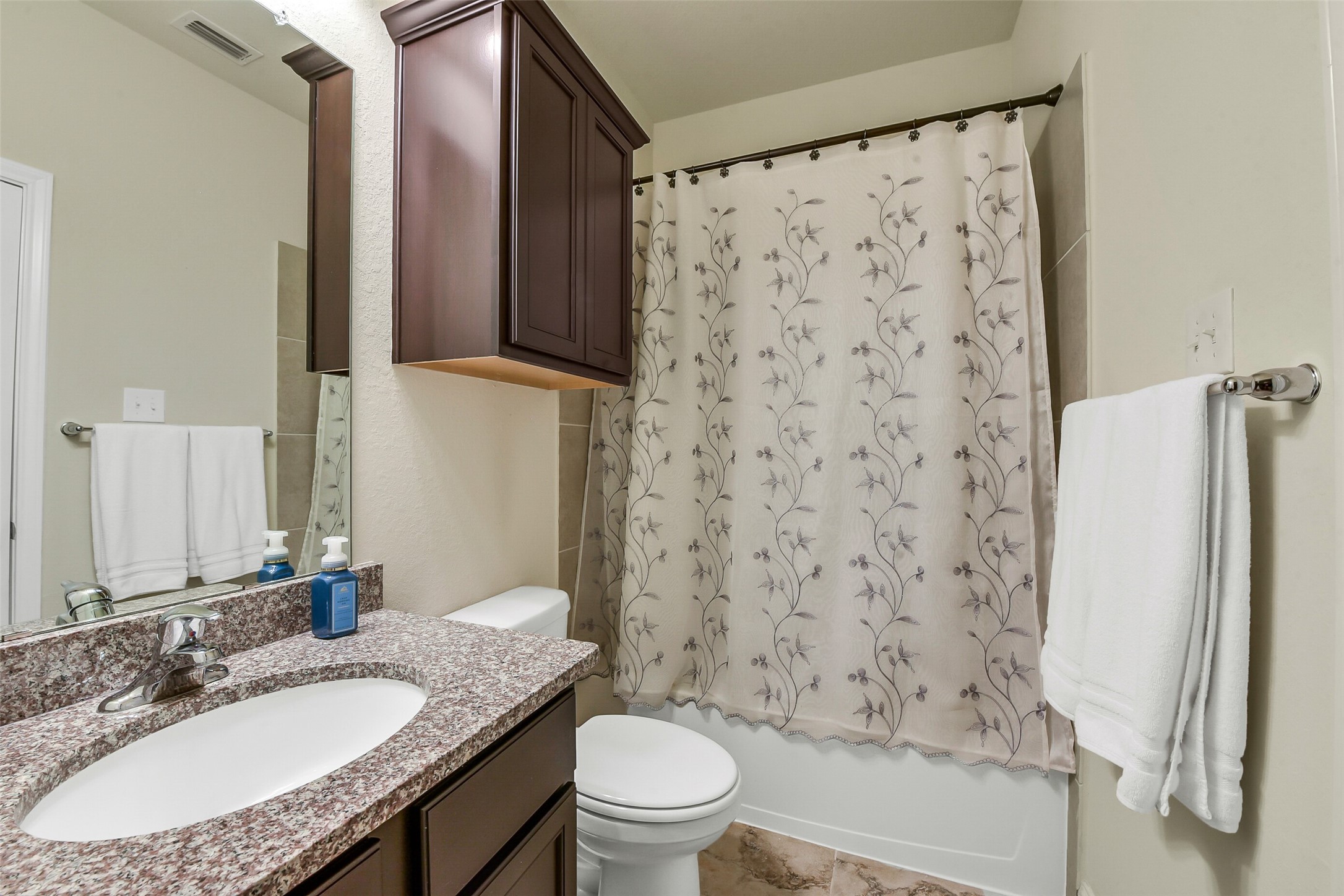 9519 Carson Lane Rosharon, TX 77583 - Photo 31 of 39 a bathroom with a granite countertop sink toilet and shower