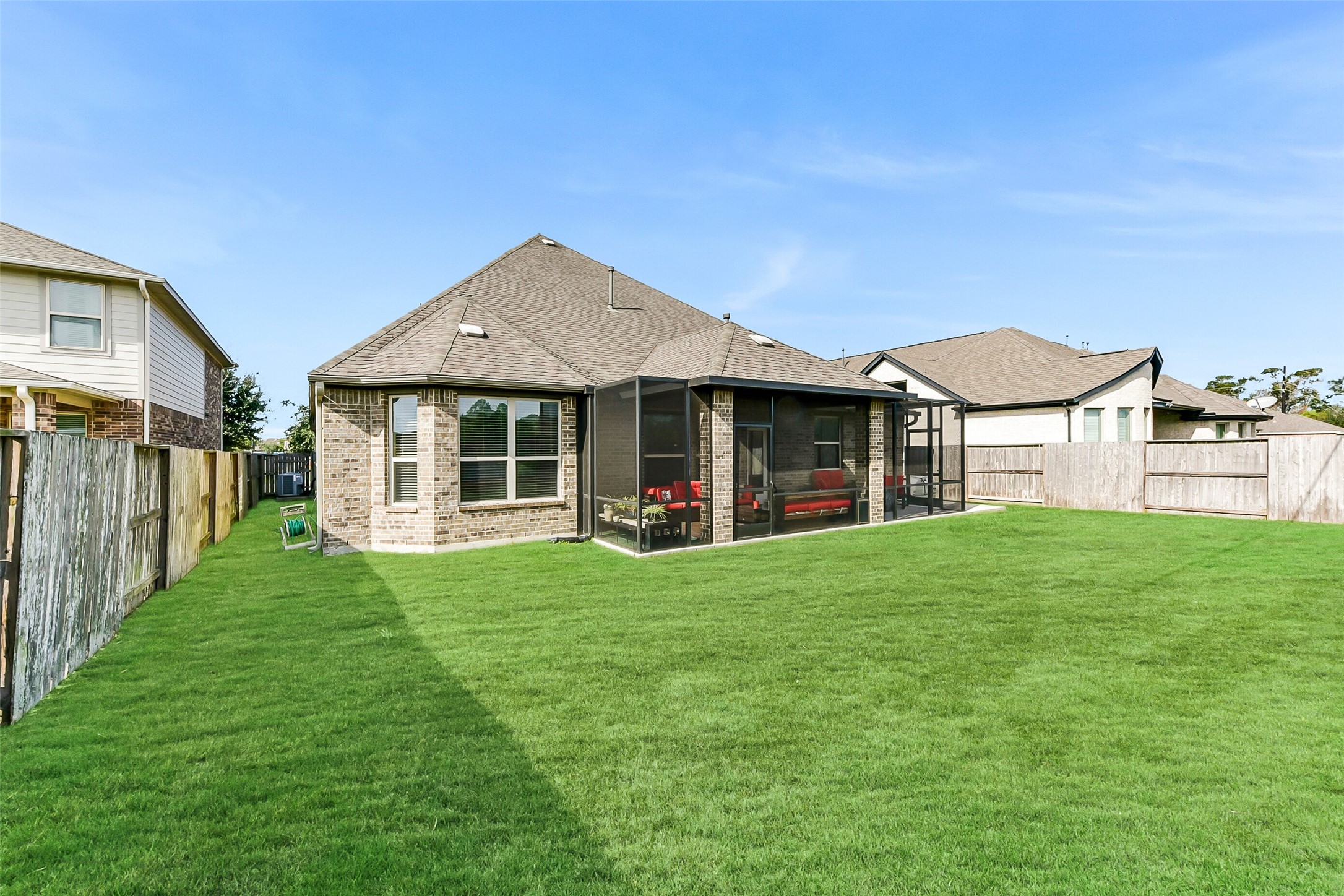 9519 Carson Lane Rosharon, TX 77583 - Photo 37 of 39 a view of a house with backyard and porch
