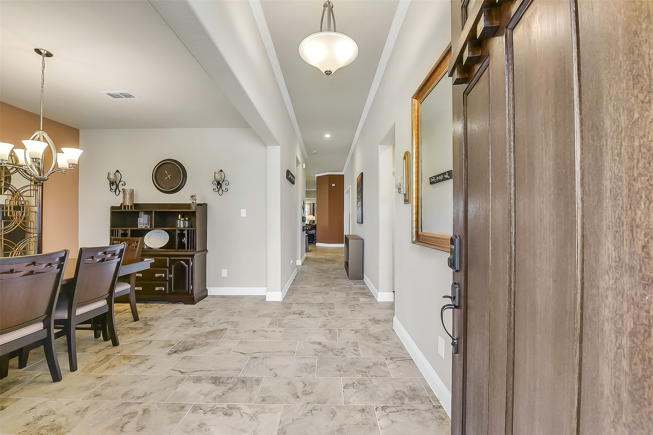 9519 Carson Lane Rosharon, TX 77583 - Photo 4 of 39 a view of an entryway with wooden floor