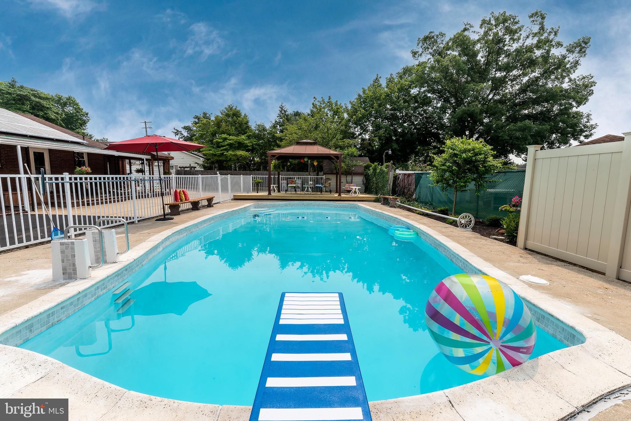 1119 Sharp Road Vineland, NJ 08360 - Photo 78 of 79 a view of a swimming pool with an outdoor seating