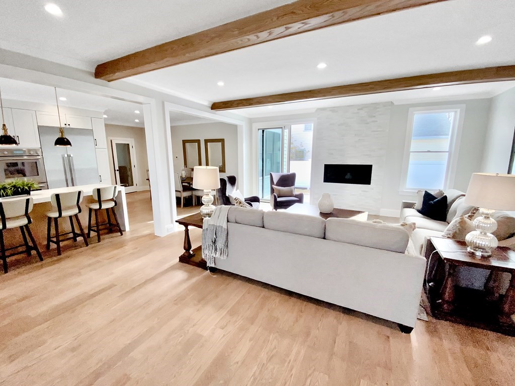 547 Webster Street Needham, MA 02494 - Photo 13 of 39 a living room with furniture and wooden floor