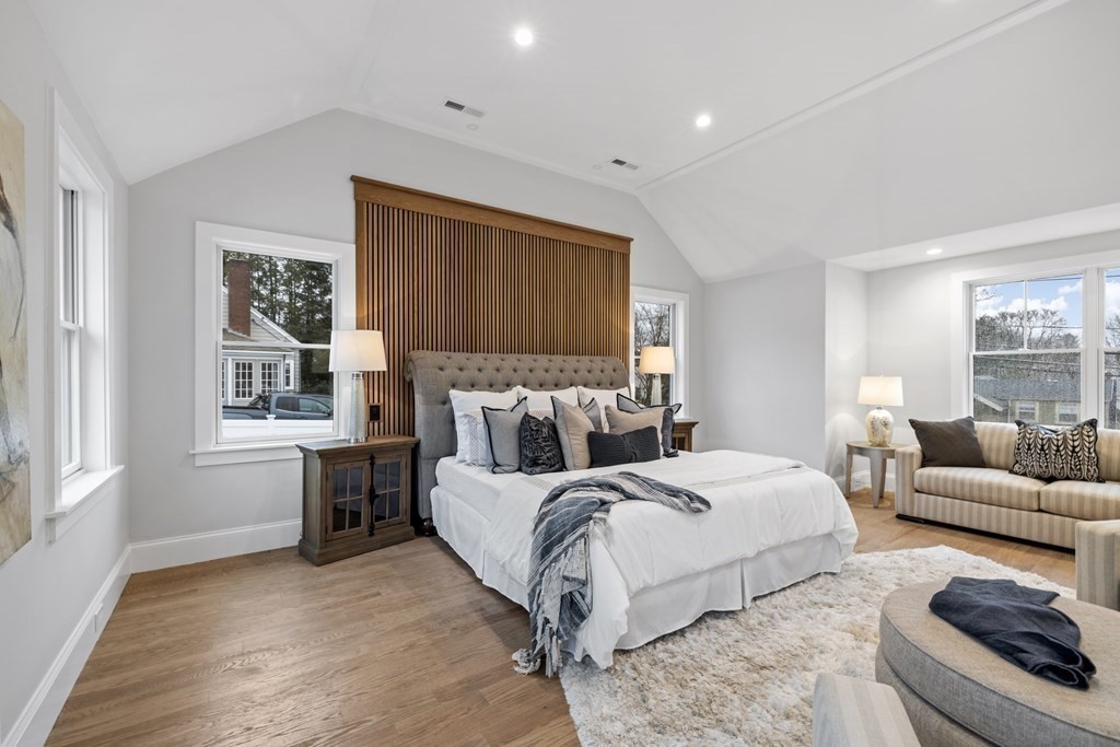 547 Webster Street Needham, MA 02494 - Photo 19 of 39 a bedroom with a bed and a couch