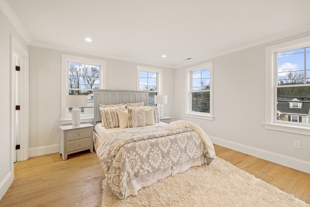 547 Webster Street Needham, MA 02494 - Photo 24 of 39 a bedroom with a bed and a window