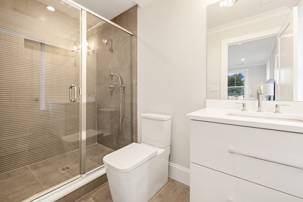 547 Webster Street Needham, MA 02494 - Photo 25 of 39 a bathroom with a sink toilet and shower