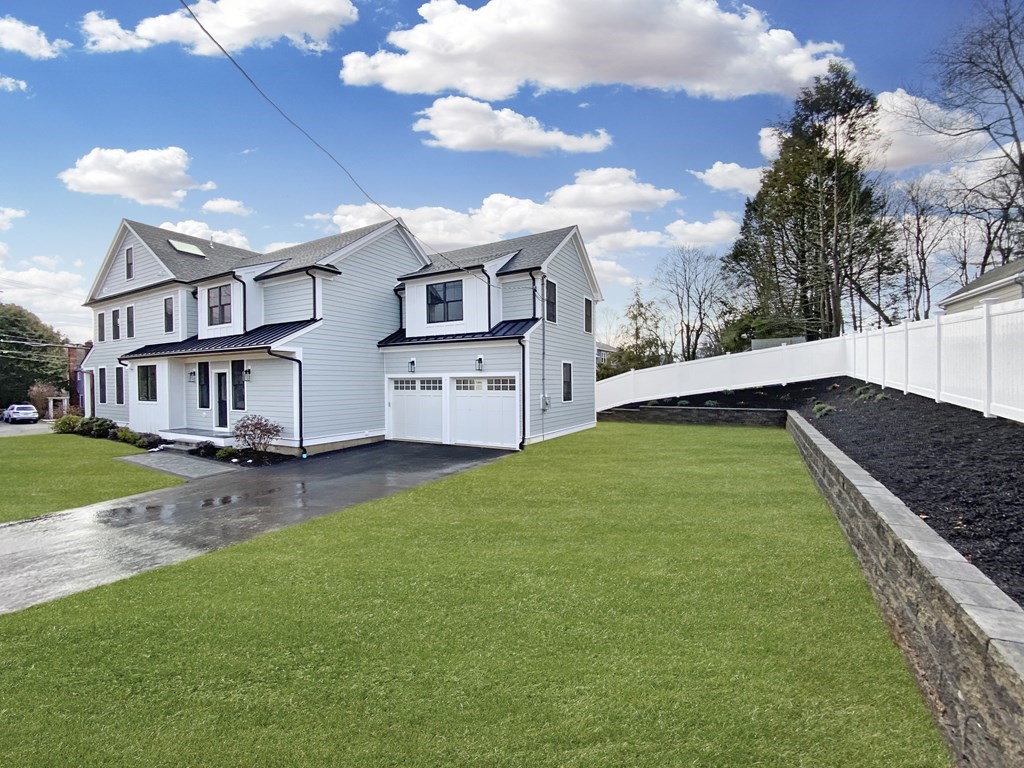 547 Webster Street Needham, MA 02494 - Photo 37 of 39 a view of a house with a yard