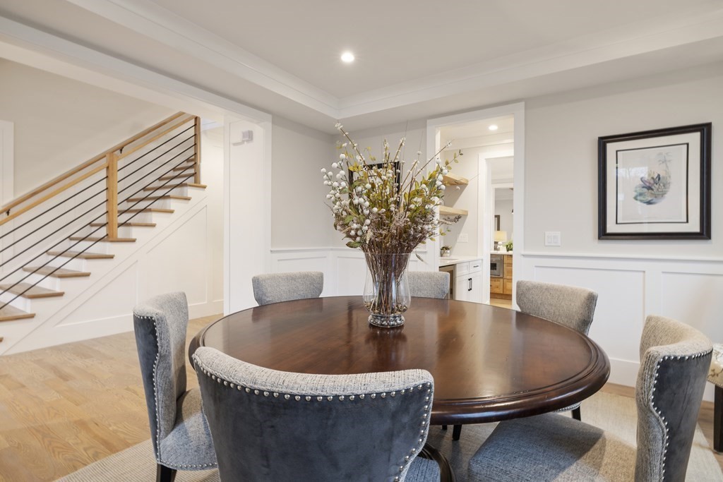547 Webster Street Needham, MA 02494 - Photo 5 of 39 a dining room with furniture and wooden floor