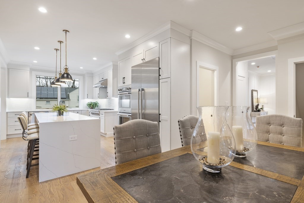 547 Webster Street Needham, MA 02494 - Photo 9 of 39 a view of kitchen with stainless steel appliances kitchen island