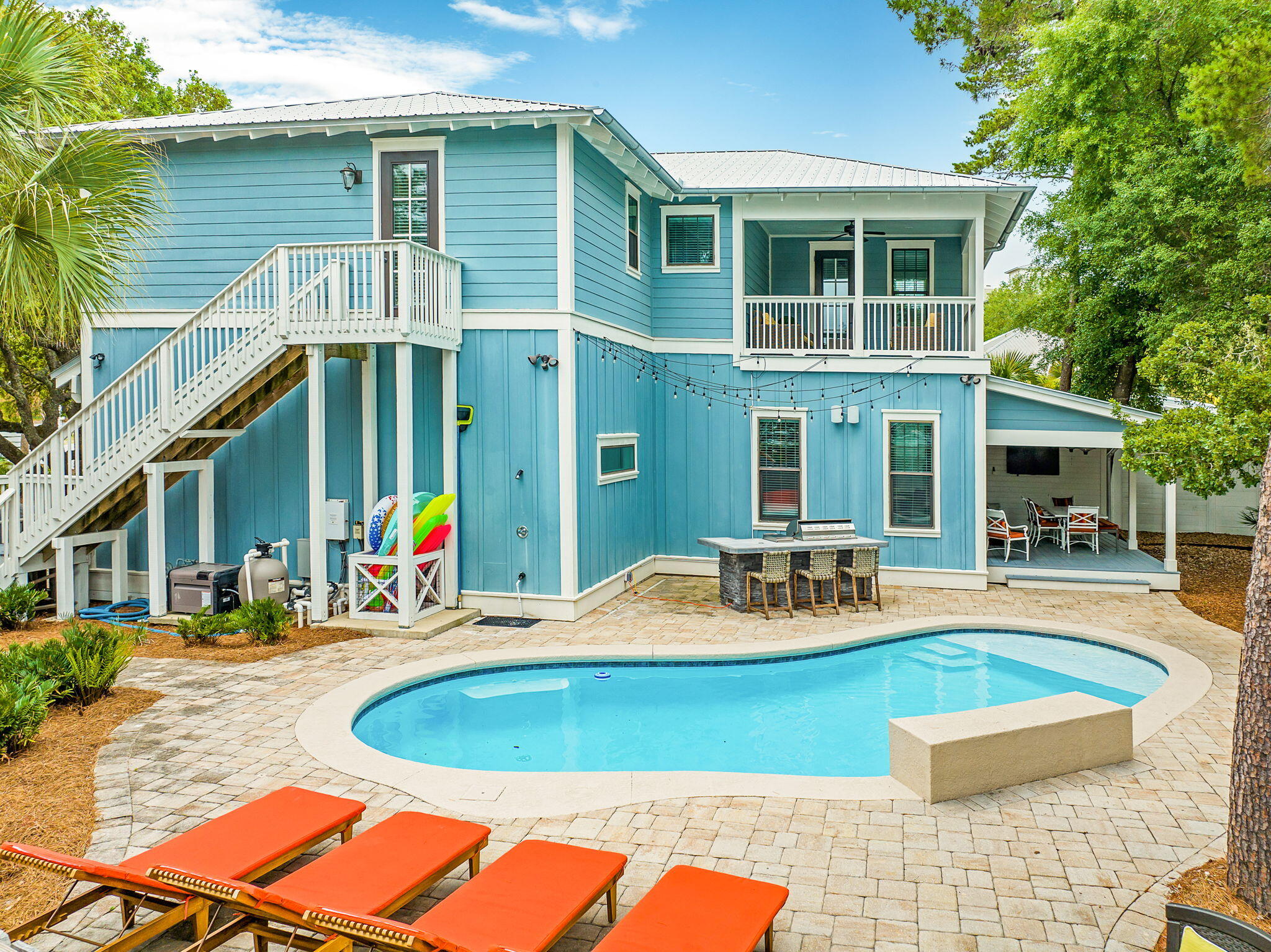 2846 South County Highway 395 Santa Rosa Beach, FL 32459 - Photo 19 of 19 a house view with swimming pool and porch