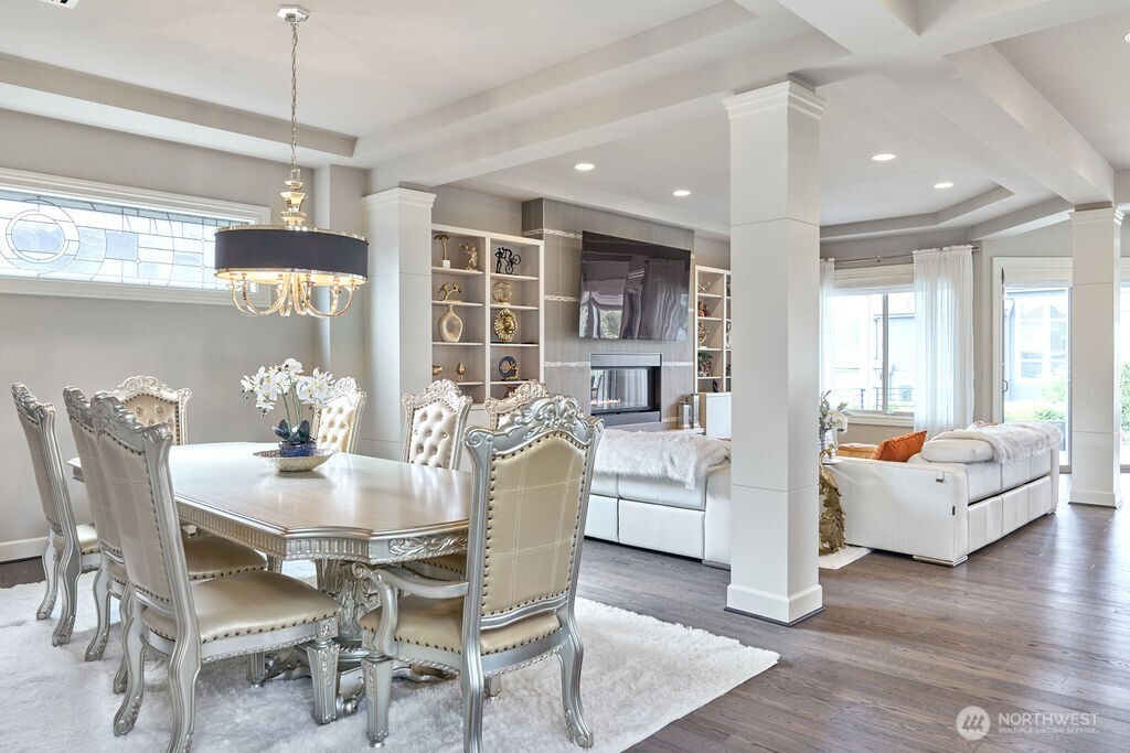 3319 Burnett Avenue North Renton, WA 98056 - Photo 11 of 40 a dining room with furniture and wooden floor