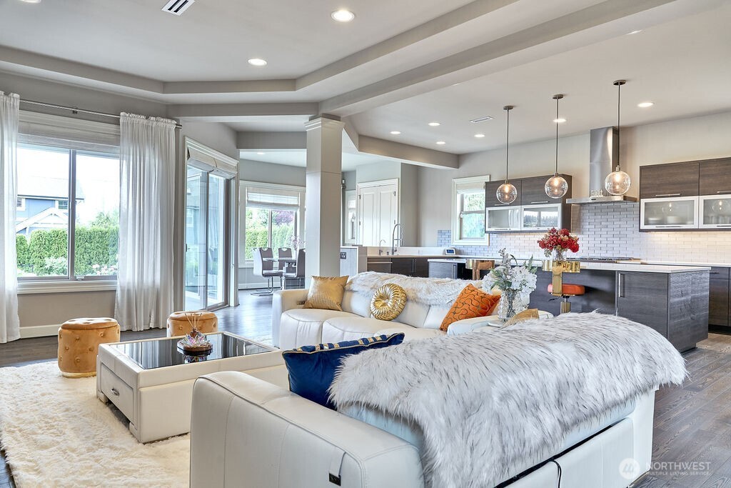 3319 Burnett Avenue North Renton, WA 98056 - Photo 13 of 40 a living room with furniture kitchen view and a large window