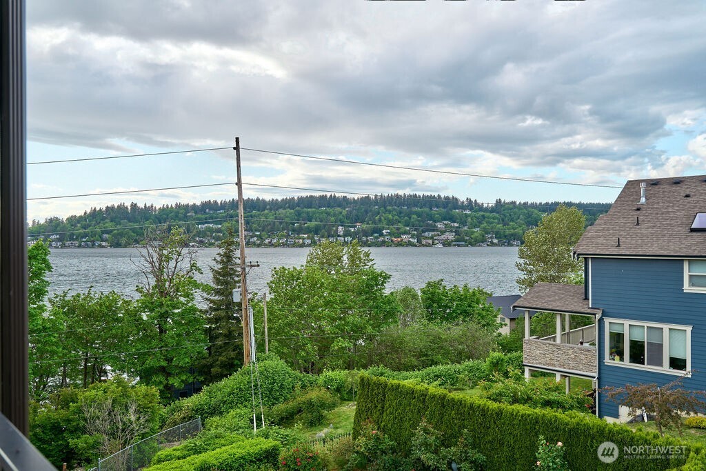 3319 Burnett Avenue North Renton, WA 98056 - Photo 27 of 40 a view of a lake with a house in the background