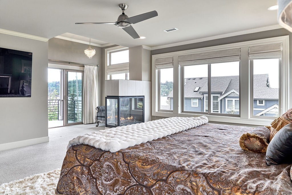 3319 Burnett Avenue North Renton, WA 98056 - Photo 30 of 40 a bedroom with a large bed and a large window